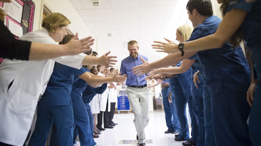 Dr. Kent Brantly leaves Emory University Hospital after being declared no longer infectious with the Ebola virus on Thursday, August 21.
