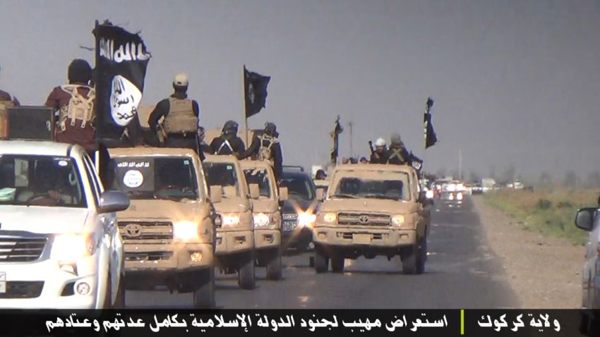 : 	Images of an ISIS parade in the Kirkuk Province