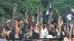 ISIS celebrates announcement of their "Caliphate."
Caption: 	This photo was tweeted from a Twitter account widely believed to belong to ISIS in Aleppo, Province, Syria. It purportedly shows celebrating ISIS' announcement of the so called Islamic Caliphate, spanning large areas of Iraq and Syria. The Islamic State in Iraq and Syria (ISIS) is a Sunni Muslim extremist group formerly linked to al-Qaeda-- al Qaeda has since denounced ISIS.