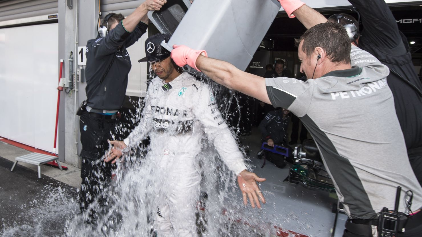 Lewis Hamilton took the ALS bucket challenge before stealing the show at Friday's practice ahead of the Belgian Grand Prix.