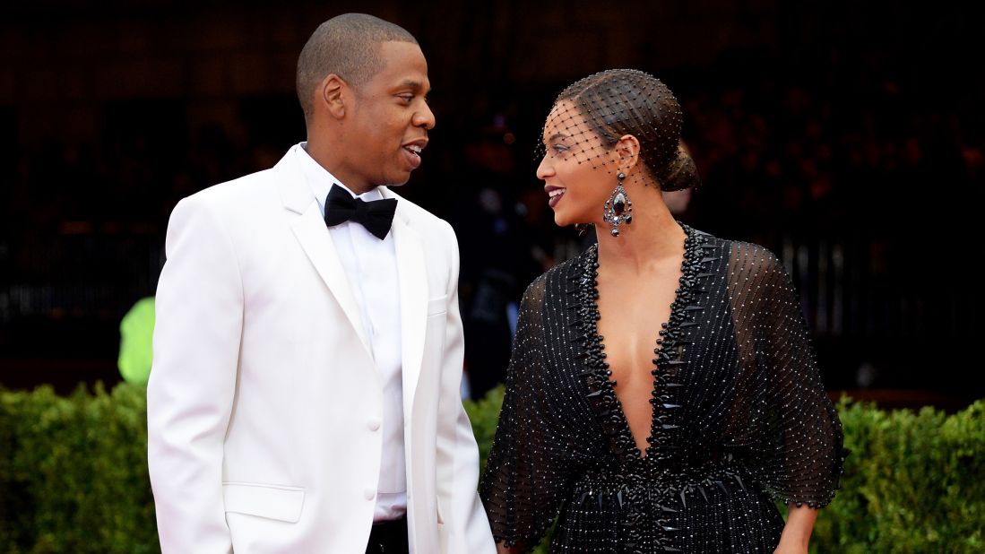 Jay Z, shown here with wife Beyonce, often sings and raps of the city that he conquered through his music.