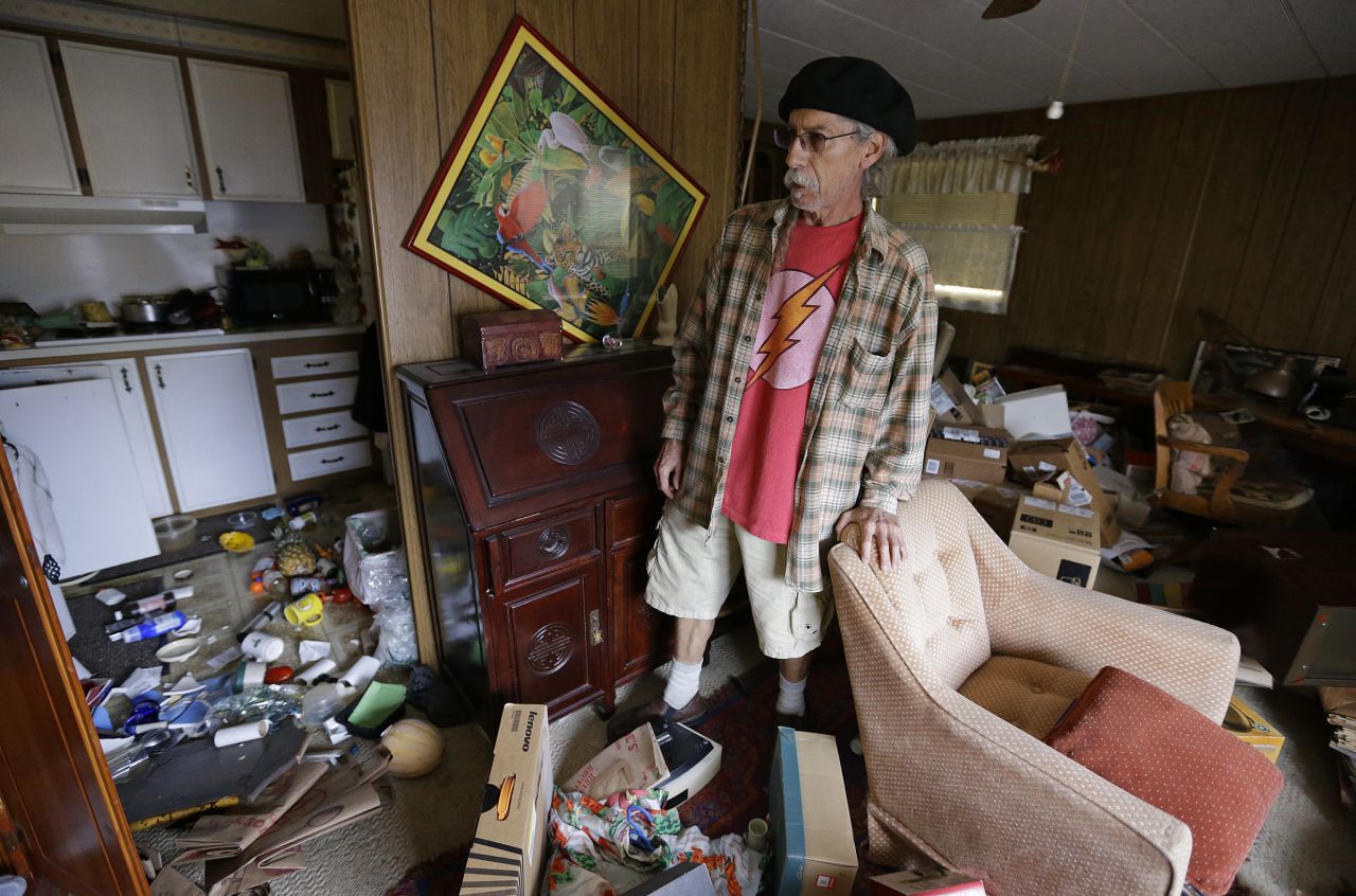 Steve Brody inspects damage to the interior of his mobile home at the Napa Valley Mobile Home Park on August 24 in Napa. 