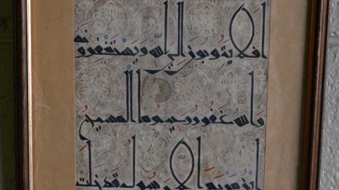 A single torn page believed to be from the Quran has sold for $68,000 at auction in Sydney.