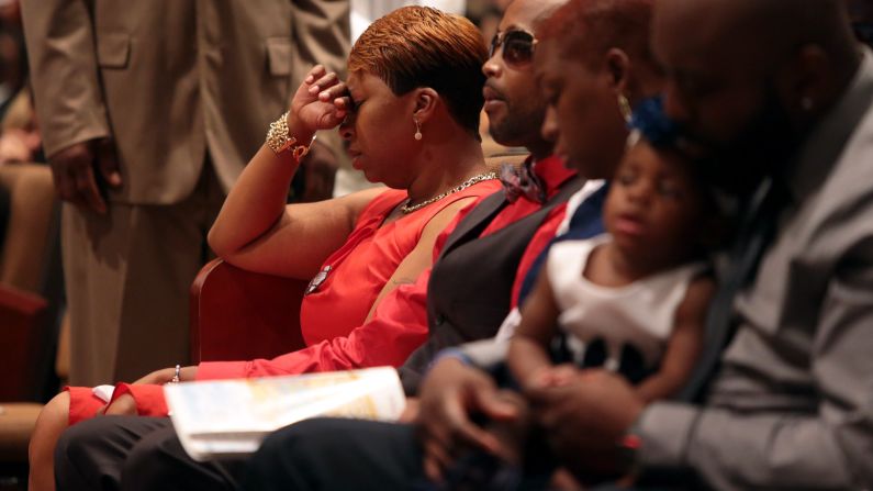 Lesley McSpadden, Brown's mother, sits during the funeral.