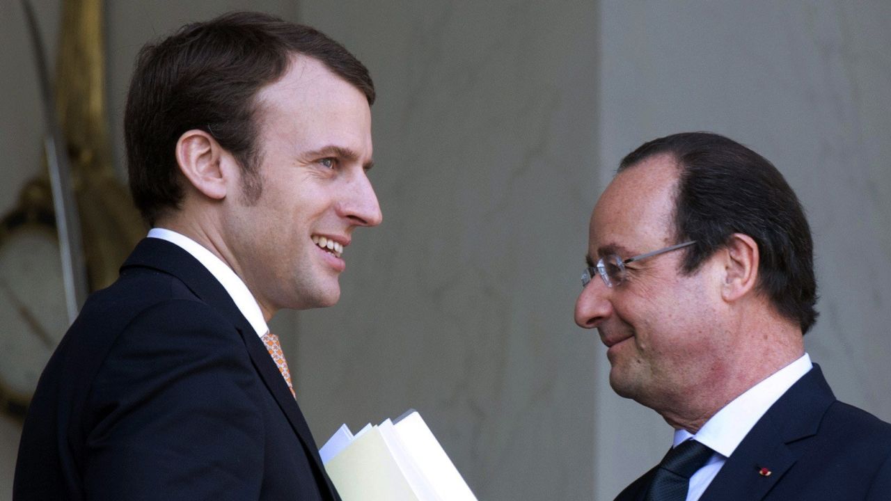 (FILES) -- A file picture taken on March 26, 2014 shows France's president Francois Hollande (R) speaking with Elysee palace's deputy secretary-general Emmanuel Macron, in Paris. French President Francois Hollande on August 26, 2014 named Emmanuel Macron, a former Rothschild banker and close ally, new economy minister in an emergency reshuffle after a major political crisis. AFP PHOTO/ ALAIN JOCARDALAIN JOCARD/AFP/Getty Images