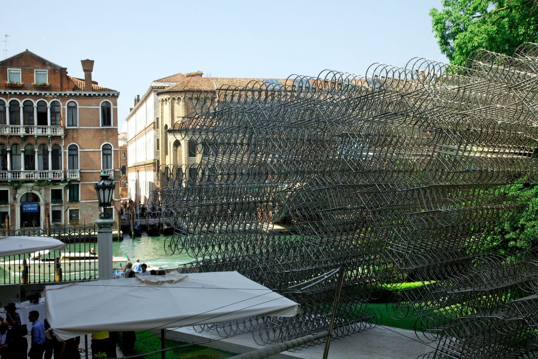 Ai Weiwei exhibits a stack of 1,179 stainless steel bikes 