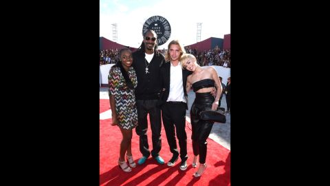 The pair joined rapper Snoop Lion's daughter Cori Broadus and Snoop on the red carpet before the awards show began at the Forum on August 24 in Inglewood, California.  