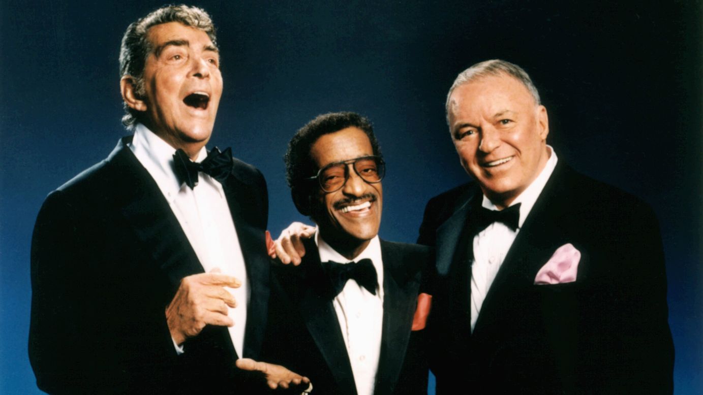 Singers and actors Dean Martin, Sammy Davis Jr. and Frank Sinatra, members of the Hollywood "Rat Pack," pose for a portrait circa 1988. These guys were always sharp as a tack, tux or no tux.
