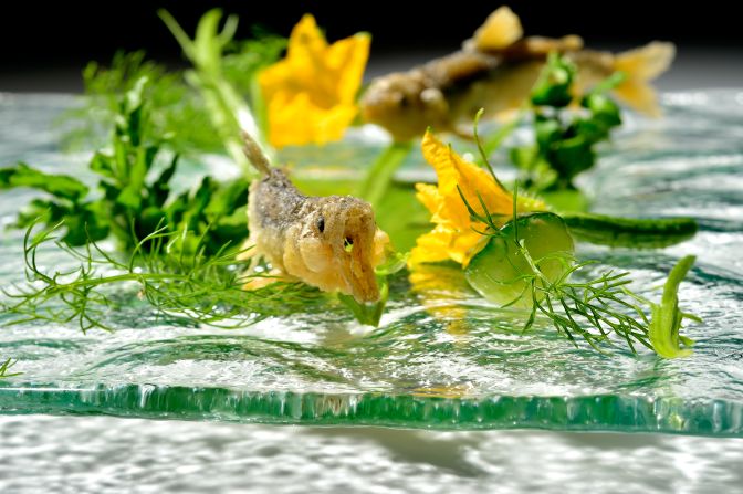 With "Ayu in Clear Stream," Takazawa uses a special technique that appears to freeze the fish in motion. The fish are served with a delicious cucumber soup, as the ayu fish is said to smell like the vegetable when it's fresh.<br /><br /><strong>Takazawa's take:</strong> "I wanted to express the summer season of the river and the mountains. Ayu is a typical seasonal river fish. I show the live ayu to the customers first so they can see how lively they look when they swim and jump in the river."