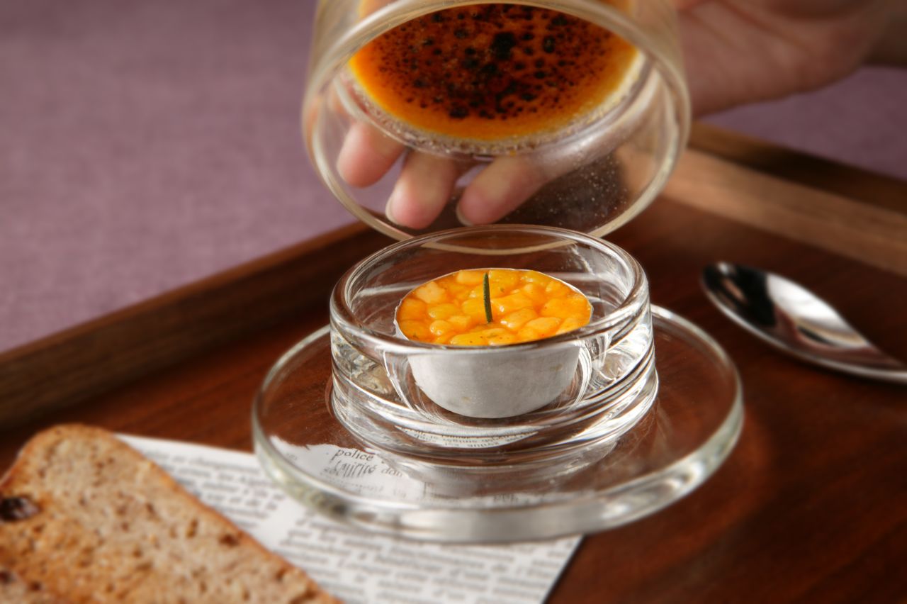 As you're cracking that layer of beautiful crème brulee -- surprise! It's a rich foie gras accompanied by mango-chile papaya salad served in an aluminum tea-light holder. <br /><br /><strong>Takazawa's take: </strong>"The dish started with this candle holder, found in a small general store in Japan. I found the shape interesting so bought (several). Later I wondered if there's any way I can utilize this for my dishes and came up with this idea. Since the top of holder should be burned as they are used, it made me think of caramelizing and crème brulee."<br /><br /><a href="http://www.takazawa-y.co.jp/" target="_blank" target="_blank"><em>Takazawa</em></a><em>, 2/F, Sanyo Akasaka Bldg., 3-5-2 Akasaka, Minato-ku; +81 (0)3 3505 5052</em><br /><br /><em>Text by CNN Producer Amanda Sealy.</em>