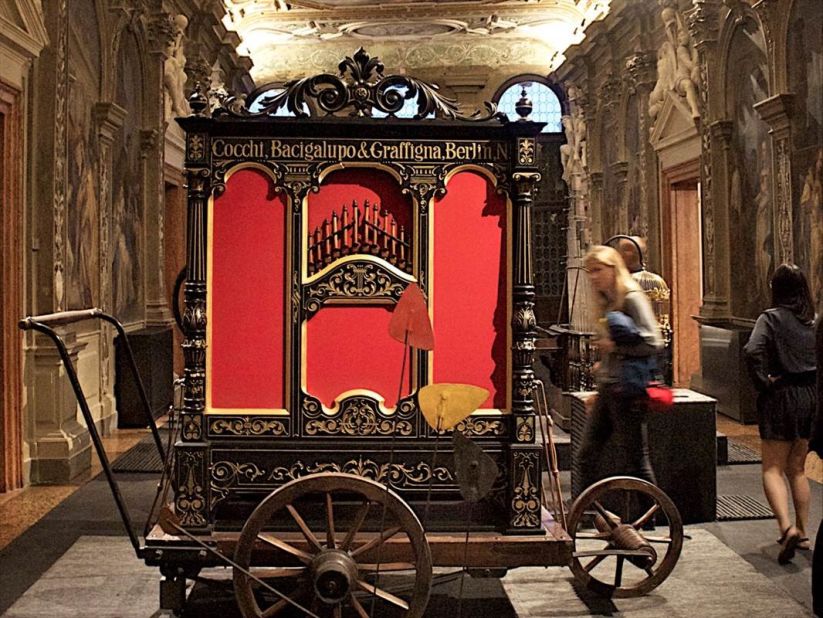 Visitors are encouraged to touch and play with the various musical contraptions. A mobile street organ from late 19th century is pictured. 