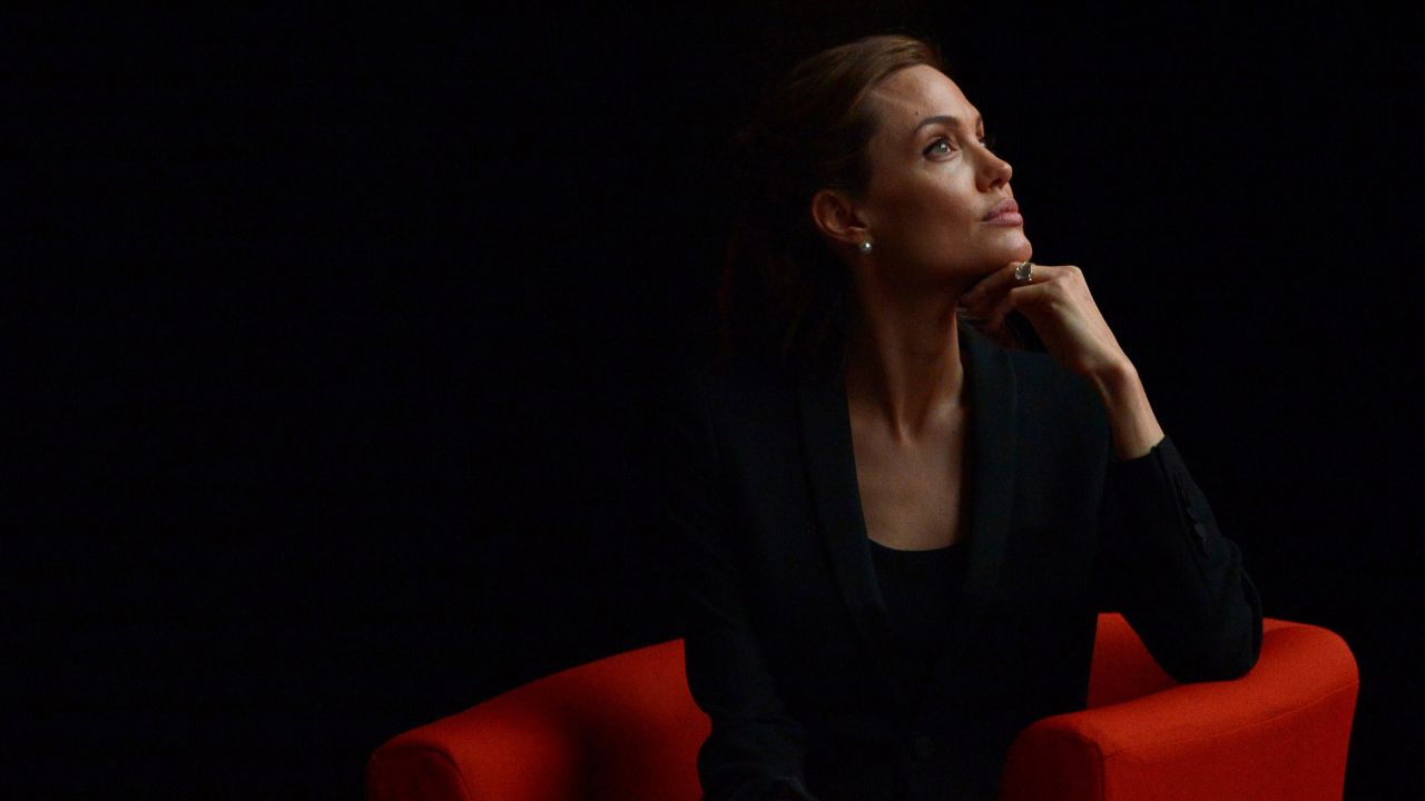 Jolie listens during to a speaker during the Global Summit to End Sexual Violence in Conflict in London on June 12.