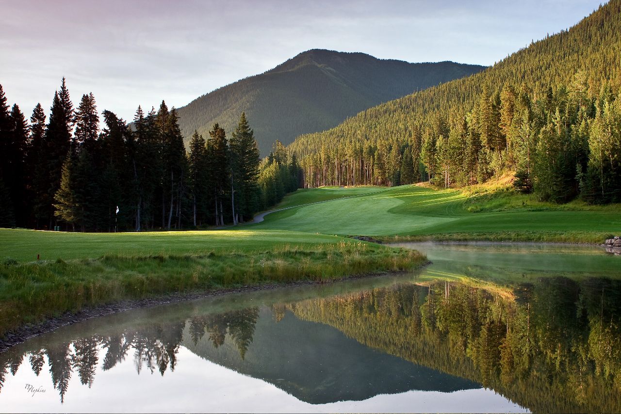 Built on an abandoned coal mine, Stewart Creek Golf and Country Club is rugged and rewarding. A massive three-peak wall known as The Three Sisters hovers over the property.
