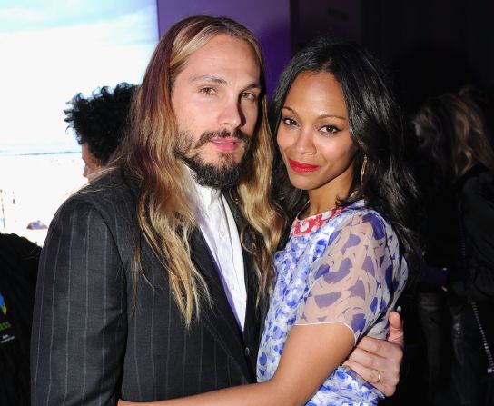 Zoe Saldana appears to be the type who'd rather show than tell. The actress and her artist husband, Marco Perego, were spotted wearing gold wedding bands in September 2013, which led to confirmation that the couple had actually married earlier that summer in front of a small gathering of family and friends. And with the couple now expecting their first child, Saldana stayed quiet until she confirmed her pregnancy by getting her husband<a href="index.php?page=&url=https%3A%2F%2Fwww.youtube.com%2Fembed%2F2cfGEUd5BTU" target="_blank" target="_blank"> to take the ALS bucket challenge for her. </a>