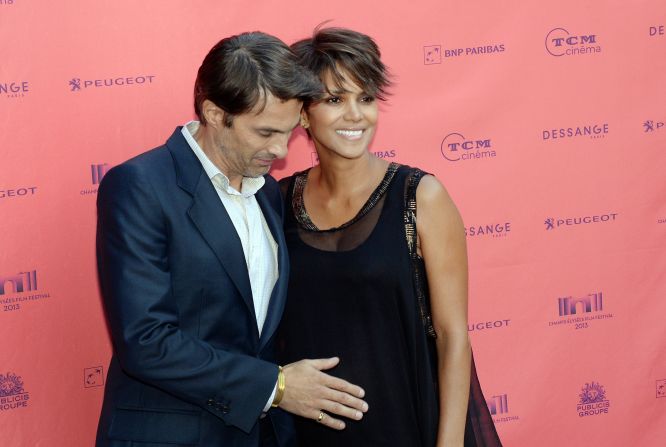 The world knew that Halle Berry was planning to marry French actor Olivier Martinez <a href="index.php?page=&url=http%3A%2F%2Fmarquee.blogs.cnn.com%2F2012%2F03%2F12%2Fhalle-berry-olivier-martinez-officially-engaged%2F%3Firef%3Dallsearch" target="_blank">as of March 2012</a> -- when Martinez himself let the news slip -- but <a href="index.php?page=&url=http%3A%2F%2Fmarquee.blogs.cnn.com%2F2012%2F04%2F17%2Fhalle-berry-on-engagement-never-say-never%2F%3Firef%3Dallsearch" target="_blank">Berry didn't talk about it until weeks later</a>. The couple's moves toward the altar were closely tracked, which meant that even though they didn't talk about it, we still knew they were <a href="index.php?page=&url=http%3A%2F%2Fwww.cnn.com%2F2013%2F07%2F14%2Fshowbiz%2Fhalle-berry-marriage%2Findex.html%3Firef%3Dallsearch" target="_blank">tying the knot in a private affair in France in July 2013.</a>