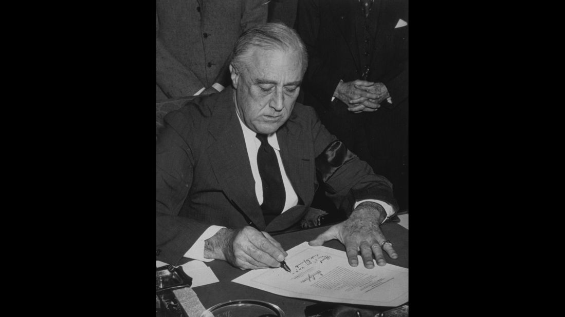 U.S. President Franklin D. Roosevelt signs the declaration of war against Japan on December 8, 1941. Italy and Germany immediately declared war on the United States, and on December 11, Roosevelt signed the U.S. declarations of war against those nations. 