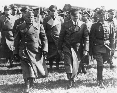 Italian dictator Benito Mussolini, left, with Hitler, center, and other leading Nazis, visits Germany during the war. Italy and Germany formed an alliance before the outbreak of war, but Italy remained a non-belligerent until June 10, 1940, when it declared war on Britain and France. Fighting spread to Greece and North Africa.
