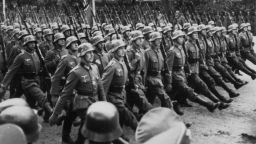 German troops march through occupied Warsaw, Poland during World War II, circa 1939. On Monday, Sept. 1, 2014, will be the 75th anniversary of the start of the World War II. On Sept. 1, 1939, Germany invades Poland, Denmark, Luxumbourg, the Netherlands, Norway, Belgium, and France soon fall into the German control, until only the United Kingdom is left to face Germany. See photo gallery highlighting the war.