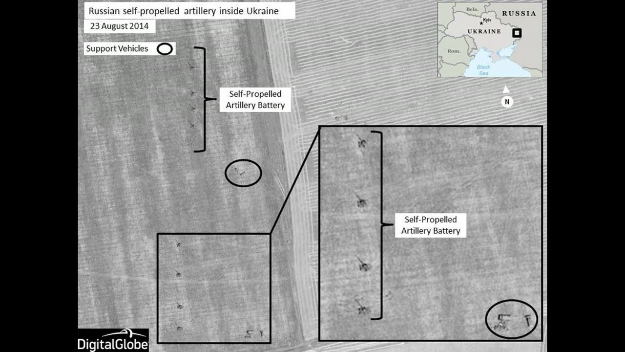 At a press conference on Thursday, August 28, Dutch Brig. Gen. Nico Tak, a senior NATO commander, revealed satellite images of what NATO says are Russian combat forces engaged in military operations in or near Ukrainian territory. NATO said this image shows Russian self-propelled artillery units set up in firing positions near Krasnodon, in eastern Ukraine. 