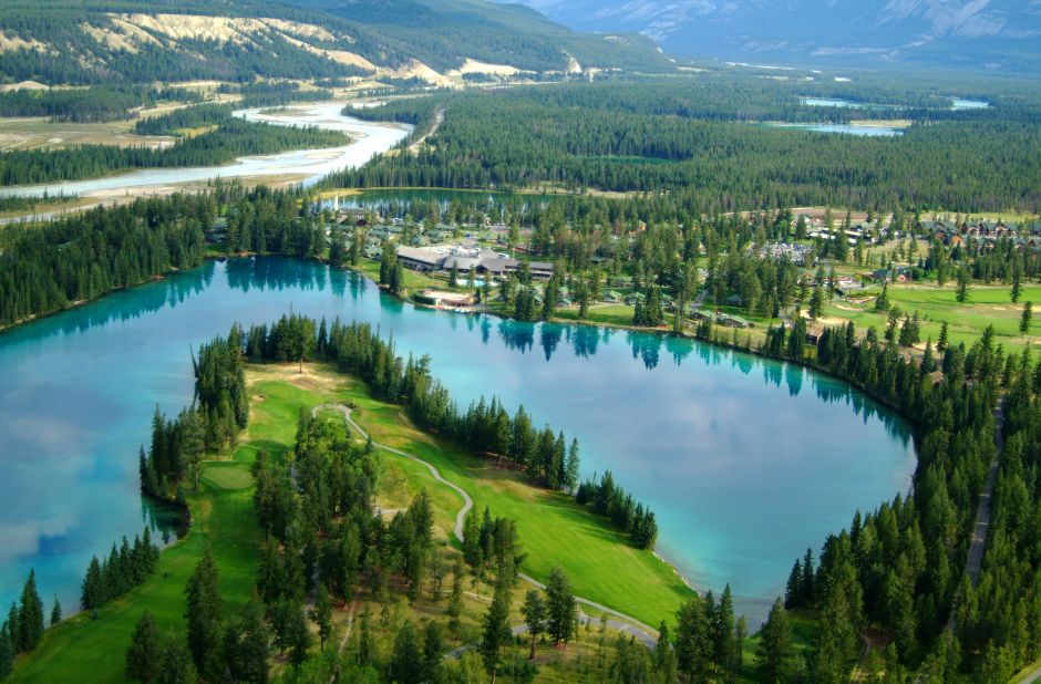 Overlooking a pristine green lake, the 14th tee at Fairmont Jasper Park Lodge requires a gutsy drive over water and through well-placed pine trees.