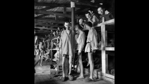 Prisoners line block 61 of Buchenwald concentration camp in April 1945. The construction of Buchenwald started July 15, 1937, and the camp was liberated by U.S. Gen. George Patton's troops on April 11, 1945. Between 239,000 and 250,000 people were imprisoned in the camp. About 56,000 died, including 11,000 Jews.  