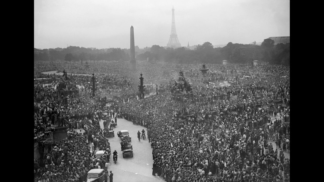 A crowd gathers to cheer Gen. Charles de Gaulle at the Place de la Concorde on August 26, 1944, a day after the liberation of Paris.