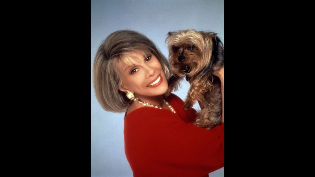 She starred on the daytime "Joan Rivers Show," for which she won a Daytime Emmy, for five seasons, from 1989-1994. Here, she poses with her dog, Spike.