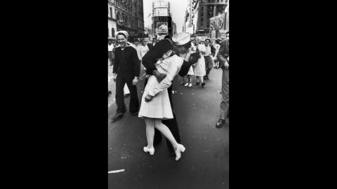 A jubilant American sailor kisses a nurse in New York's Times Square on August 14, 1945, as he celebrates the news that Japan has surrendered. (Because of the time difference between the two nations, the surrender occurred August 15 in Japan).