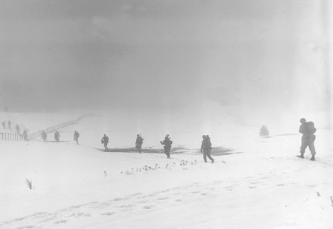 Soldiers of an infantry division move into the mist over a snow-covered field near Krinkelter, Belgium, on December 20, 1944, during the Battle of the Bulge, a surprise German counter-offensive against Allied forces as they closed in on German soil from the west. It resulted in more combined U.S. losses (nearly 90,000 killed, wounded or captured) than any battle of the war.