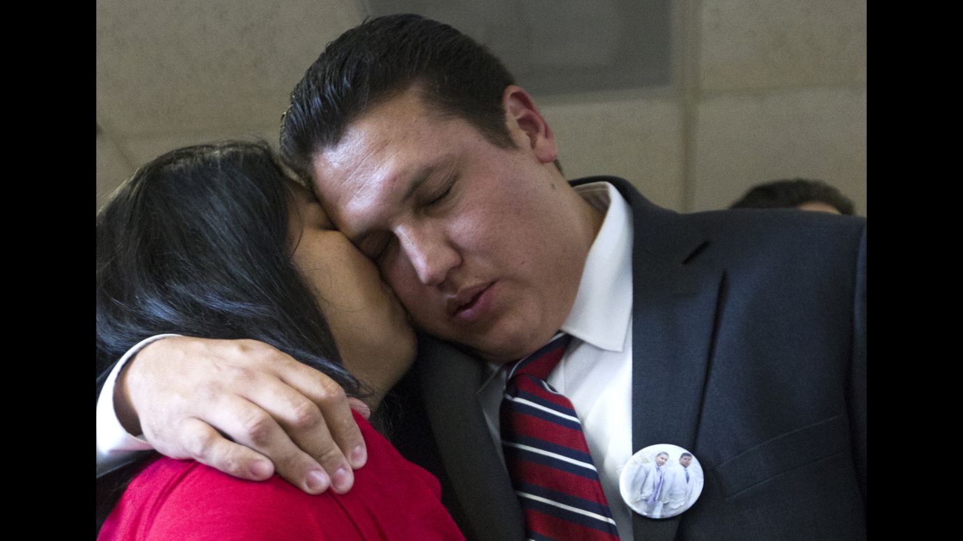 David Barajas gets a kiss from his wife, Cindy, after a jury <a href="http://www.cnn.com/2014/08/28/us/texas-father-acquittal/index.html">acquitted him of murder</a> in Angleton, Texas, on Wednesday, August 27. Barajas was accused of fatally shooting Jose Banda in December 2012, minutes after Banda hit a truck Barajas and his two sons were pushing after it ran out of gas. Twelve-year-old David Jr. and 11-year-old Caleb were both killed. Barajas could have been sentenced to up to life in prison if he had been convicted.