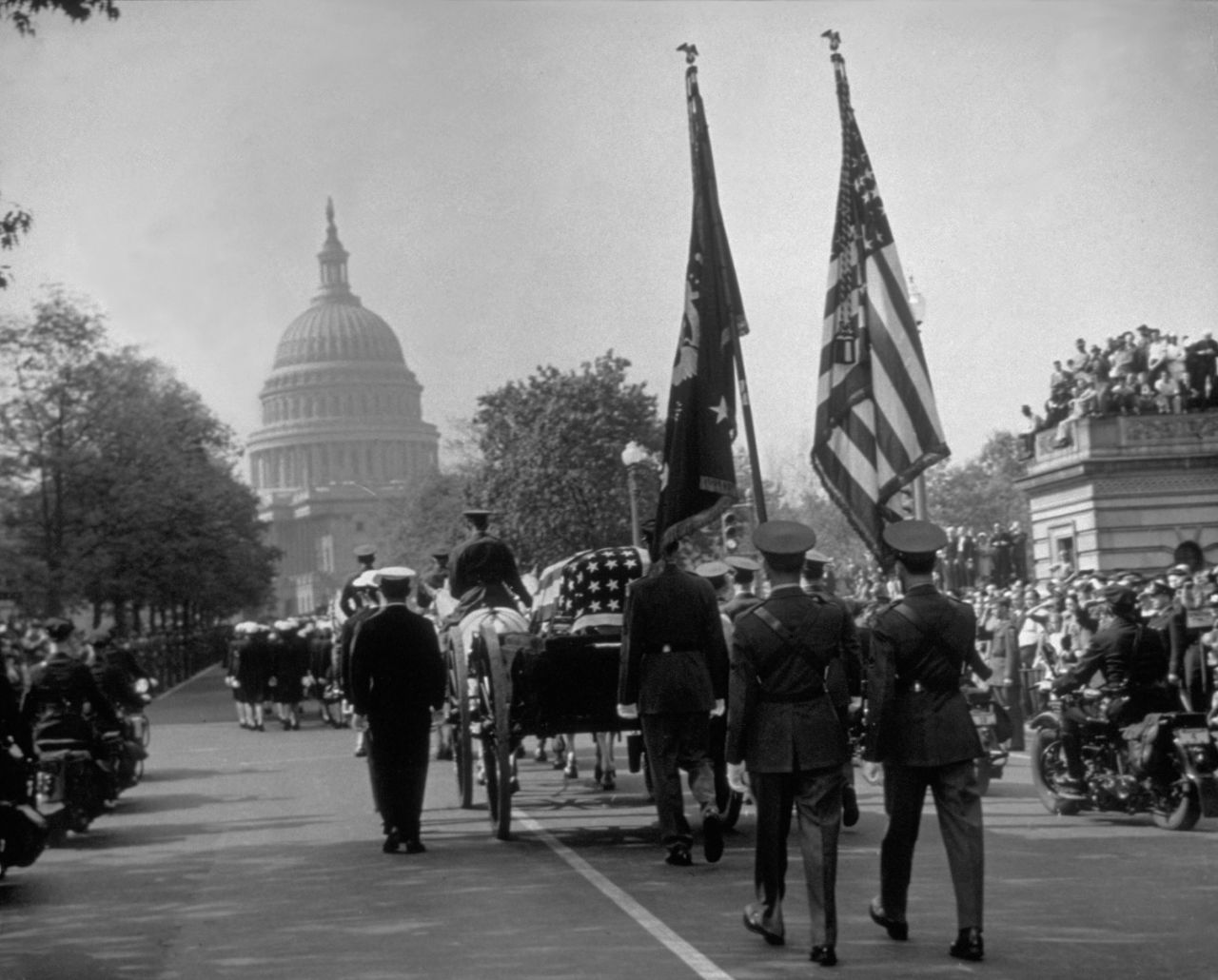 President Franklin D. Roosevelt's funeral procession goes down Connecticut Avenue on its way to the White House. Roosevelt died on April 12, 1945, in Warm Springs, Georgia, just weeks before Germany's surrender.