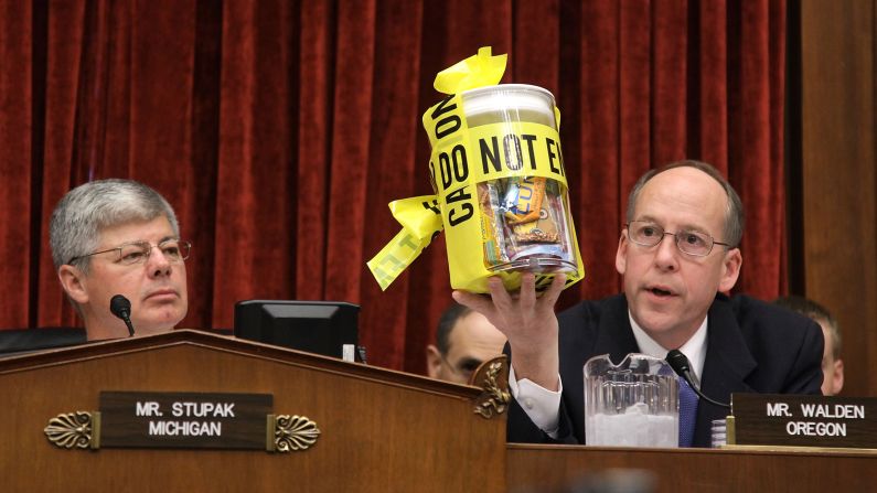 U.S. Rep. Greg Walden, R-Oregon, holds up a jar of peanut products while questioning Stewart Parnell, owner and president of the Peanut Corp. of America, at a salmonella hearing in 2009. Parnell stands accused of deliberately shipping tainted food from his plant in Georgia.