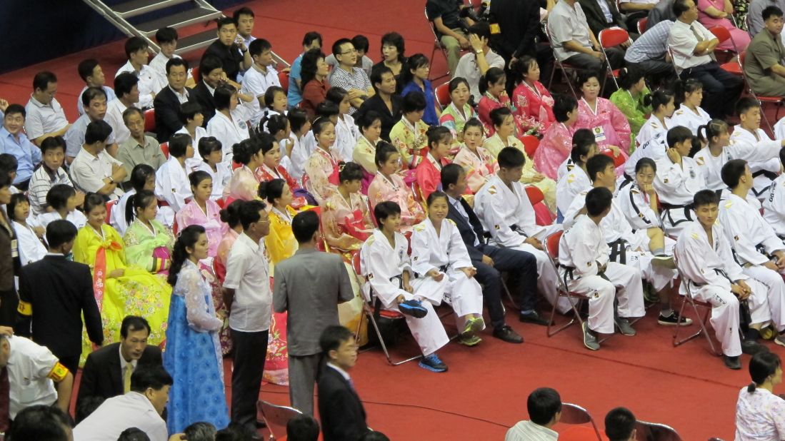 North Korean dance and tae kwon do students prepare to perform for the crowd of 13,000 at the wrestling festival. 
