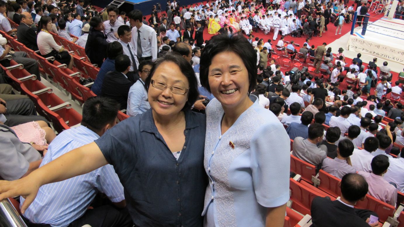 The woman on the left is a blogger living in South Korea and the woman on the right lives in North Korea. Both attended a pro-wrestling festival in Pyongyang.