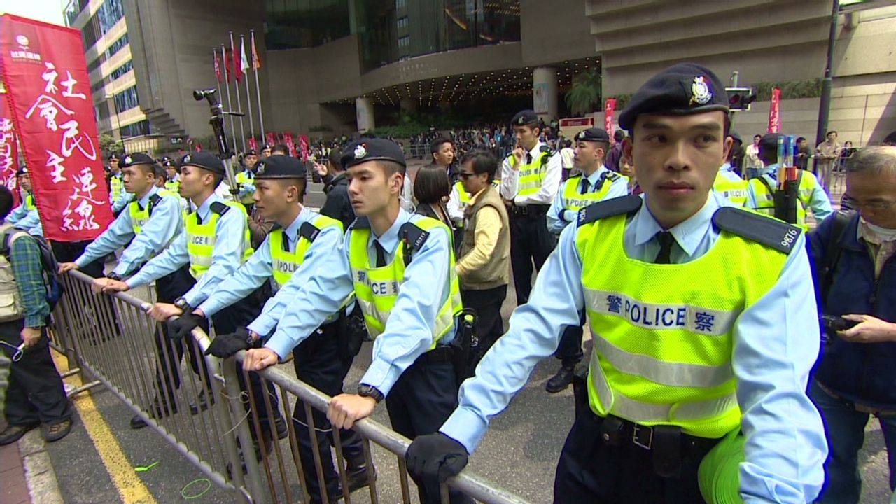 Police ready for demonstrations on August 31, 2014, following an announcement from Beijing that Hong Kong will not have fully open elections.