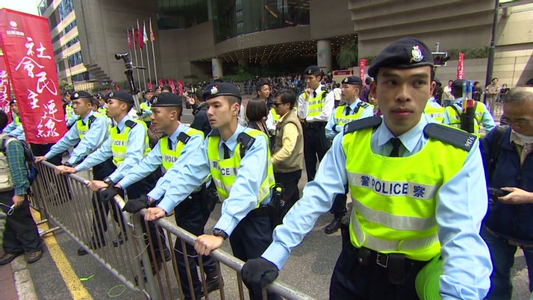 Police ready for demonstrations on August 31, 2014, following an announcement from Beijing that Hong Kong will not have fully open elections.