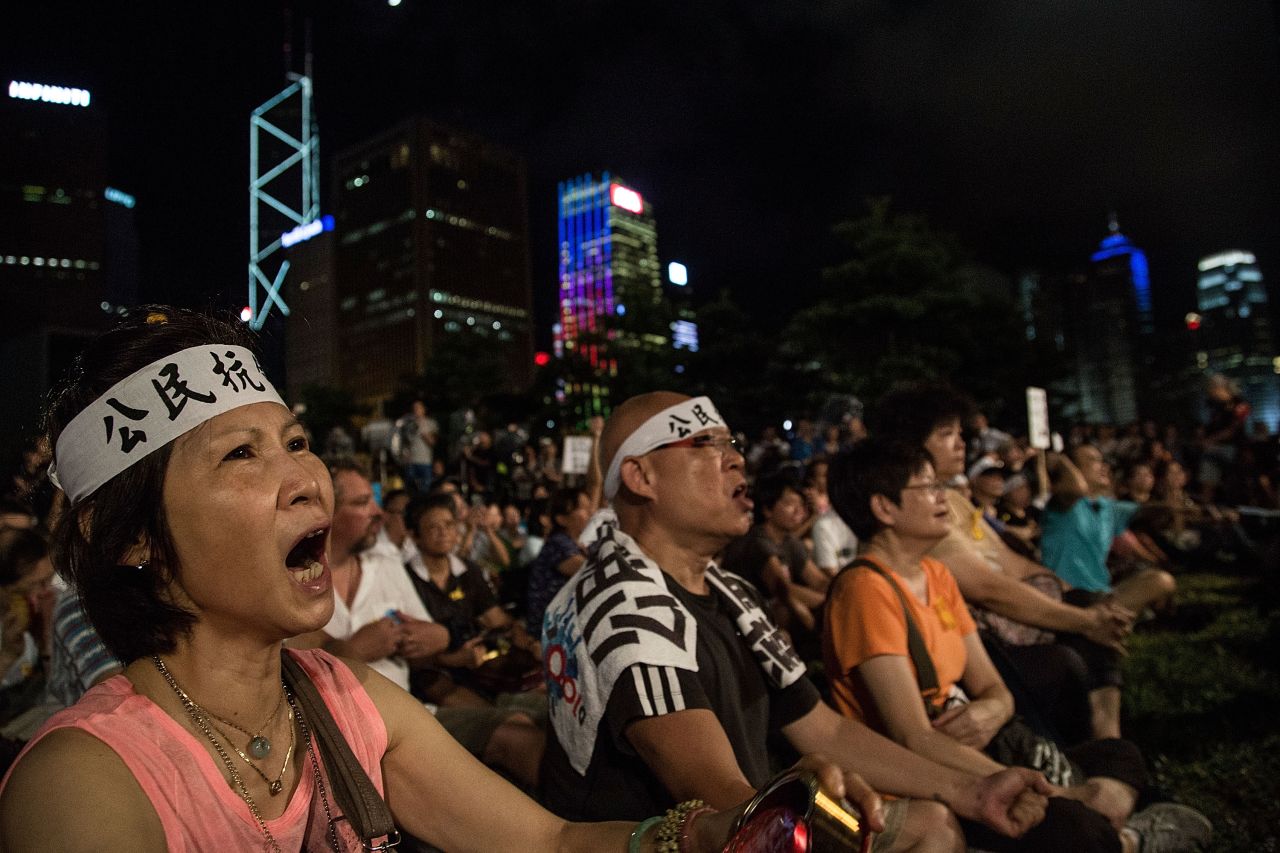 Hong Kong protesters say the Chinese government's proposal breaks the promise of full universal suffrage for Hong Kong, as agreed upon in 1997 when the British handed Hong Kong back to China.