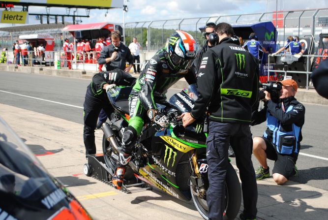 Tech3 Yamaha's British rider Bradley Smith was forced into the pits after his rear wheel rim broke. He rejoined the race and managed to get within a lap of the pack, to loud cheers from the home crowd.
