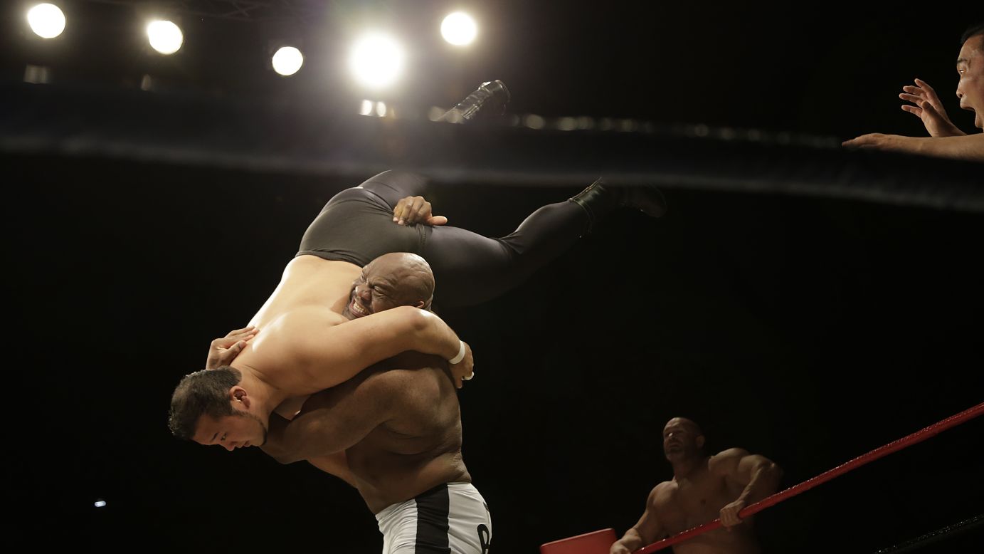 Bob "The Beast" Sapp lifts his opponent during a pro wrestling match held Saturday, August 30, in Pyongyang, North Korea. The exhibition, put together by Japanese pro wrestling legend Antonio Inoki, was <a href="http://www.cnn.com/2014/08/31/world/asia/north-korea-ripley-wrestling/index.html">the first pro wrestling event North Korea has seen in almost 20 years.</a>