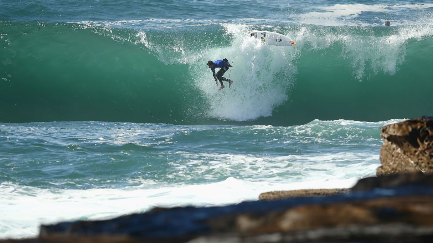 Ian Walsh wipes out Sunday, August 31, during the Red Bull Cape Fear surfing event at Sydney's Cape Solander.