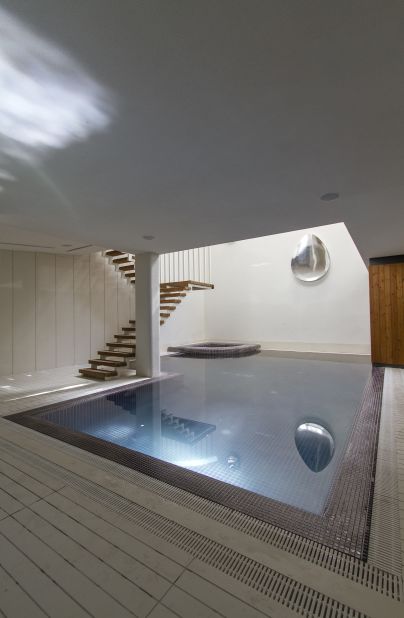 Below the rotating rooms, the "wellness areas" provide a place for the inhabitants to relax. 