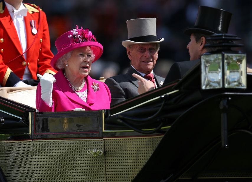 The royal couple arrives at the Royal Ascot horse races in June 2014.