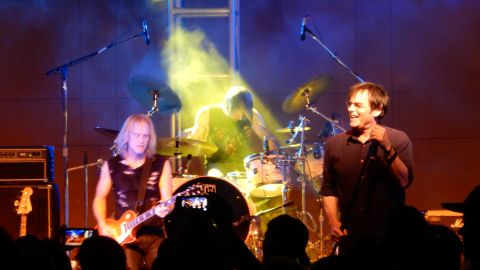 Jimi Jamison, right, performs with Survivor on August 30, 2014, in Morgan Hill, California.