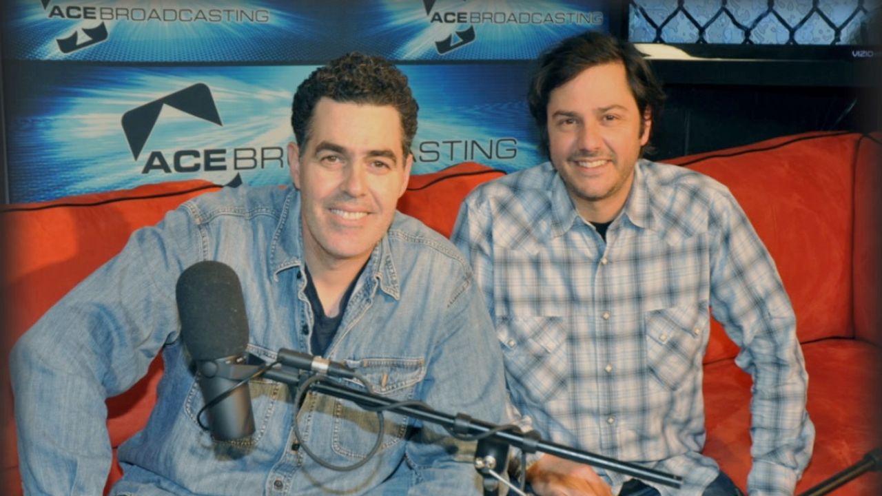 Old friends Adam Carolla, left, and Donny Misraje worked on what became the most downloaded podcast ever.