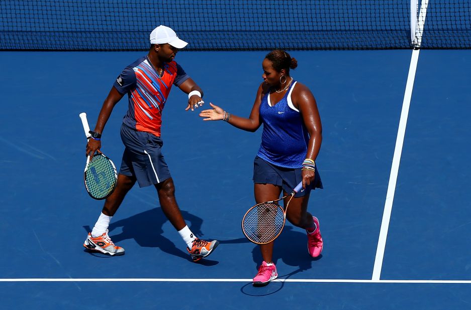 Teenager Taylor Townsend, who is coached by Garrison, is seen as another rising U.S. women's star. She is pictured here with mixed doubles partner Donald Young -- a former junior boys world No. 1 -- at the 2014 U.S. Open.