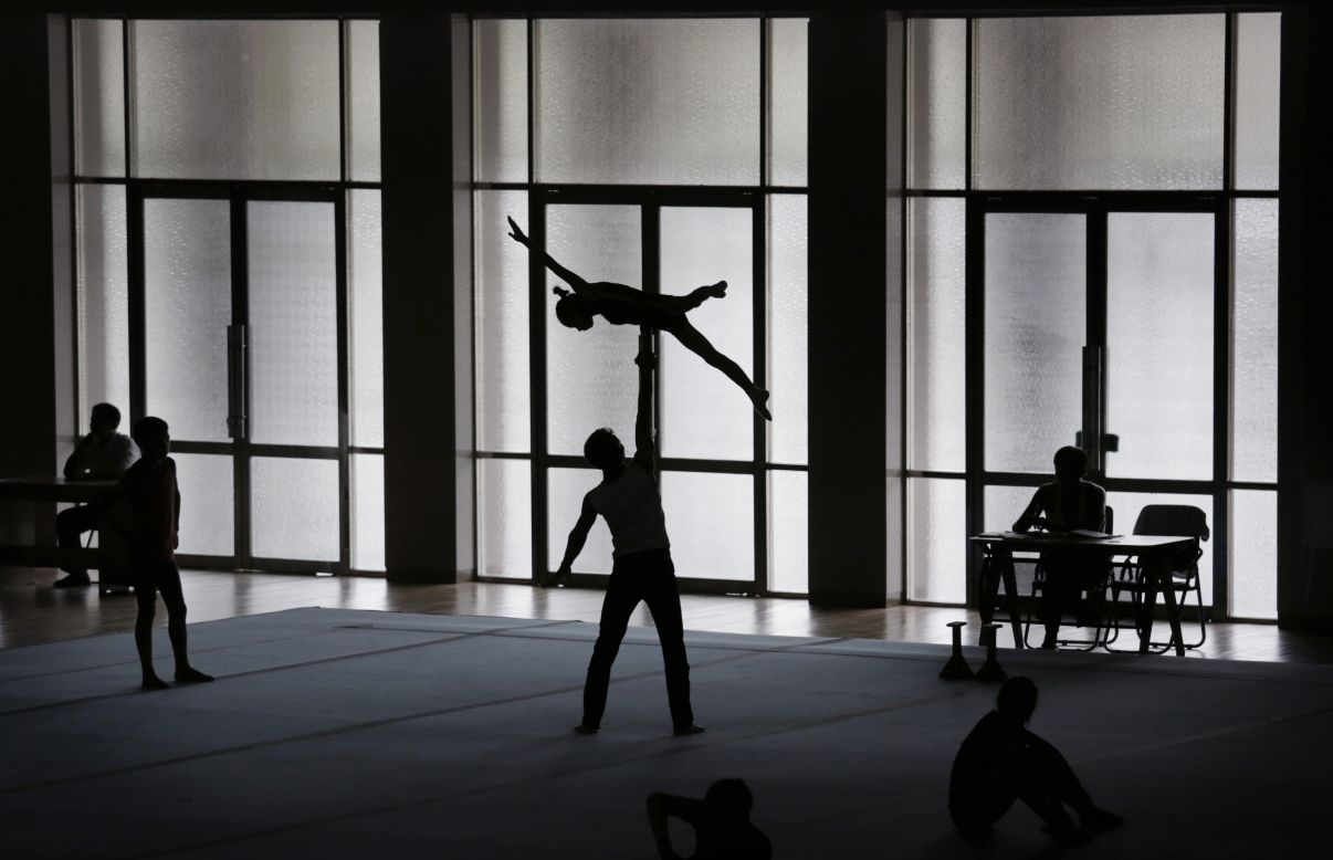 SEPTEMBER 2 - PYONGYANG, NORTH KOREA: Gymnasts practice their routines for the Asian Games in Incheon, South Korea. Beginning on September 19 and held every four years, the competition is said to be<a href="http://www.ocasia.org/game/GamesL1.aspx?9QoyD9QEWPeJ2ChZBk5tvA==" target="_blank" target="_blank"> the biggest multi-sport event after the Olympic Games. </a>