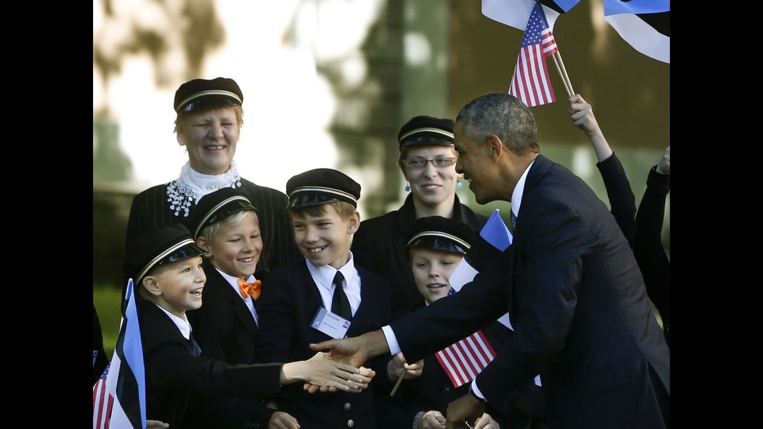 Children welcome Obama to Kadriorg Palace in Tallinn on September 3. Obama's visit to Estonia sought to reassure nervous Eastern European nations that NATO's support for its member states is unwavering.