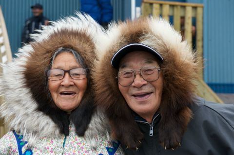 These Ulukhaktok residents, near Inuvik in Canada's Northwest Territories, pose for a photographer from EYOS Expeditions -- a company set up to help superyachts and cruise lines travel to remote regions.