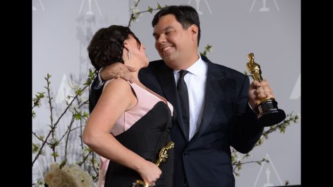 Robert Lopez, right, became the youngest EGOT recipient -- the winner of an Emmy, Grammy, Oscar and Tony -- when he won the best original song Oscar for "Let It Go." He co-wrote the song with his wife, Kristen Anderson-Lopez.