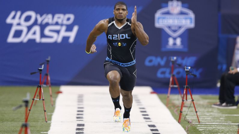 Sam runs the 40-yard dash February 2, 2014, during the NFL Scouting Combine in Indianapolis.